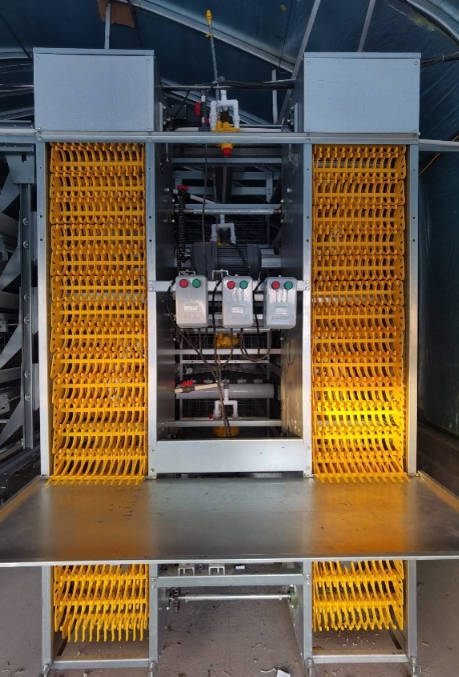 Stacked Egg Collection System for Layer Cages – Vertical Elevator Egg Collector